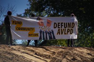 Protesters at Police Substation Groundbreaking Ceremony: “DEFUND AVLPD”